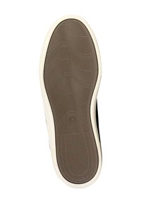 Black sneaker sole with a textured brown rubber bottom and white trim, featuring a size "42" mark and a wavy grip pattern.