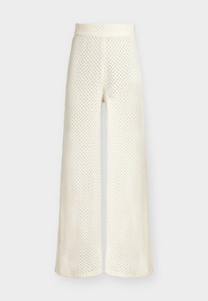 Pantalon crème taille haute à jambes larges avec un motif tricoté perforé et un tissu doux texturé.