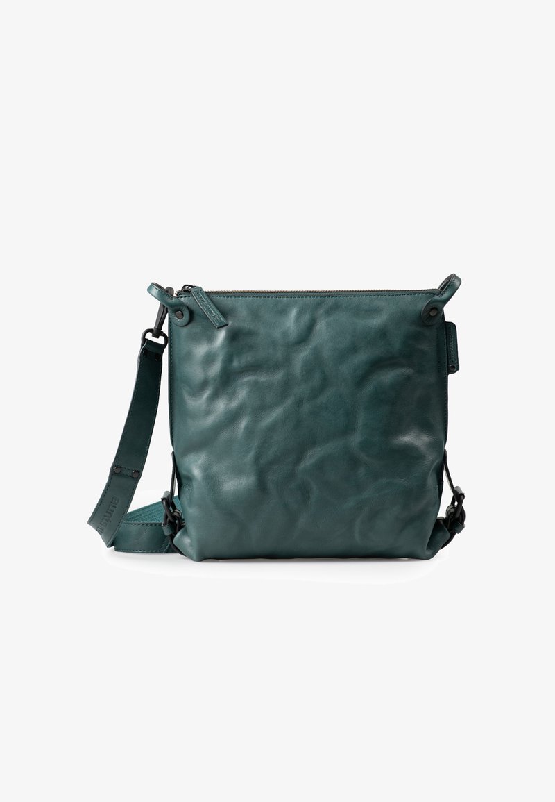 Borsa a tracolla in pelle turchese con superficie tessurizzata, chiusura con zip, tracolla regolabile e dettagli in metallo sui lati.