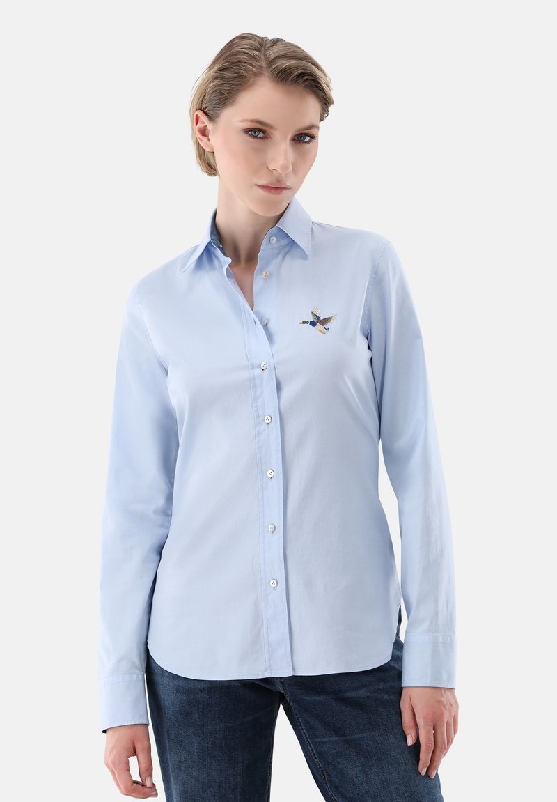 Light blue long-sleeve shirt made of cotton, featuring a button-up front and an embroidered duck design on the left chest.
