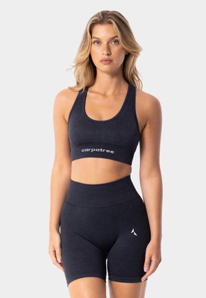 YASMINE  - Brassières de sport à maintien normal - black