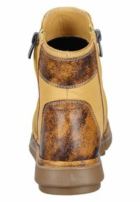 Manitu Stiefelette - gelb