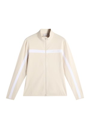 Giacca beige con zip e maniche lunghe, con strisce orizzontali bianche sulle maniche, collo alto e logo sottile sul petto.