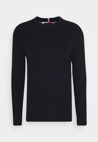 Pull noir en maille avec manches longues, col rond et texture côtelée. Présente un détail rayé contrastant au niveau de l'encolure et des poignets ajustés.