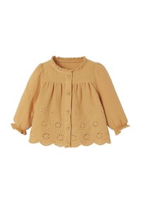 Long-sleeve, mustard yellow blouse with ruffled collar, button front, and embroidered floral pattern along the hem. Textured fabric.