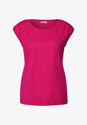 Fuksjowa koszulka z krótkim rękawem wykonana z bawełny, z okrągłym dekoltem i luźnym krojem. Gładka tekstura, jednolity kolor, bez wzorów i akcentów.