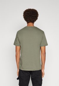 Lacoste Basic póló - khaki