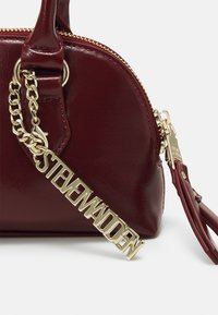 Steve Madden Käekott - bodeaux