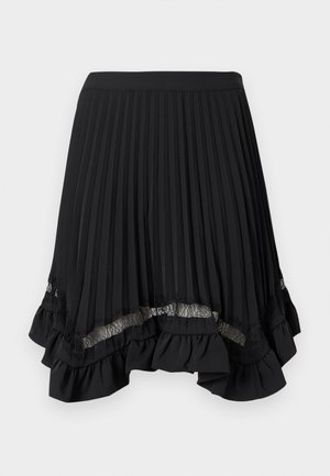 Jupe plissée noire avec un ourlet à volants, ornée d'accents en dentelle en bas. Fabriquée en tissu léger avec une texture lisse.