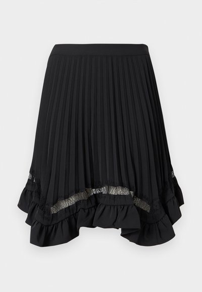 Mustast voltides seelik, mille ääres on volangid ja alumisel äärel pitsdetailid. Valmistatud õhukesest kangast, millel on sile tekstuur.