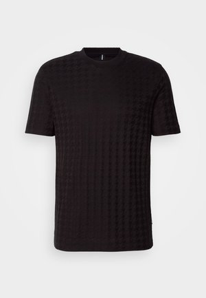 Must musta lühikeste varrukatega T-särk, millel on tekstureeritud hundihammaste muster, ümar kaelus ja kerge läikeefekt. Valmistatud pehmest kangasegust.