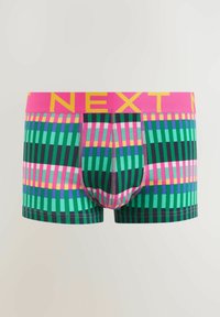 Men’s boxer briefs with green, pink, blue, and yellow vertical striped pattern and bright pink waistband with yellow "NEXT" text.