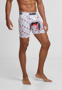 Vita boxershorts med ett hajar-mönster och färgglada cirkulära mönster. Har en svart "PSD" midja. Mjuk, stretchig tyg.