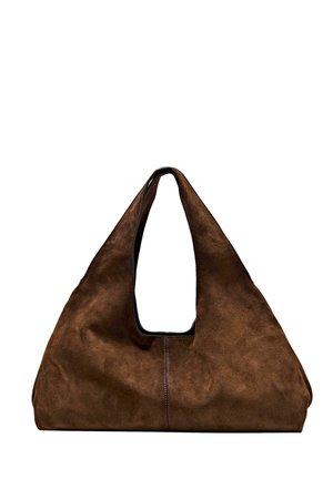 Brown suede tote bag with a wide, rounded body, deep cutout handle, and contrasting black lining. Soft texture with visible stitching details.