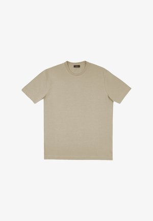 Camiseta beige de manga corta con cuello redondo, mostrada extendida con etiqueta del cuello visible sobre un fondo blanco.