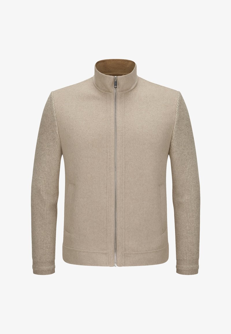 Beige Zip-Jacke mit strukturierten Strickärmeln und fleecegefüttertem Stehkragen, ausgestattet mit seitlichen Taschen und gerippten Bündchen.
