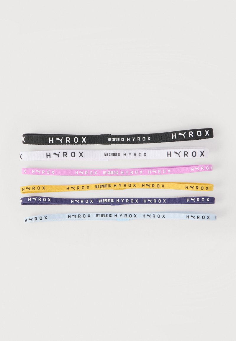 Five flat elastic sports headbands in black, white, pink, yellow, and navy, each printed with "HYROX" and "My sport is HYROX."