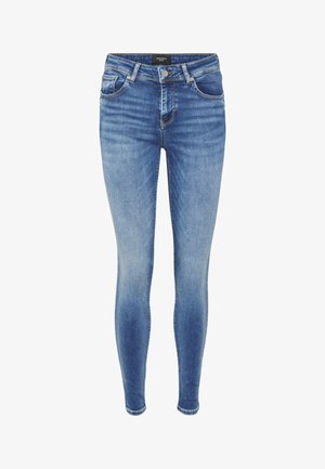 Peenikesed teksad keskmises sinises denimis, millel on sile tekstuur, klassikaline viie taskuga disain ja õrnad pleekimise detailid.