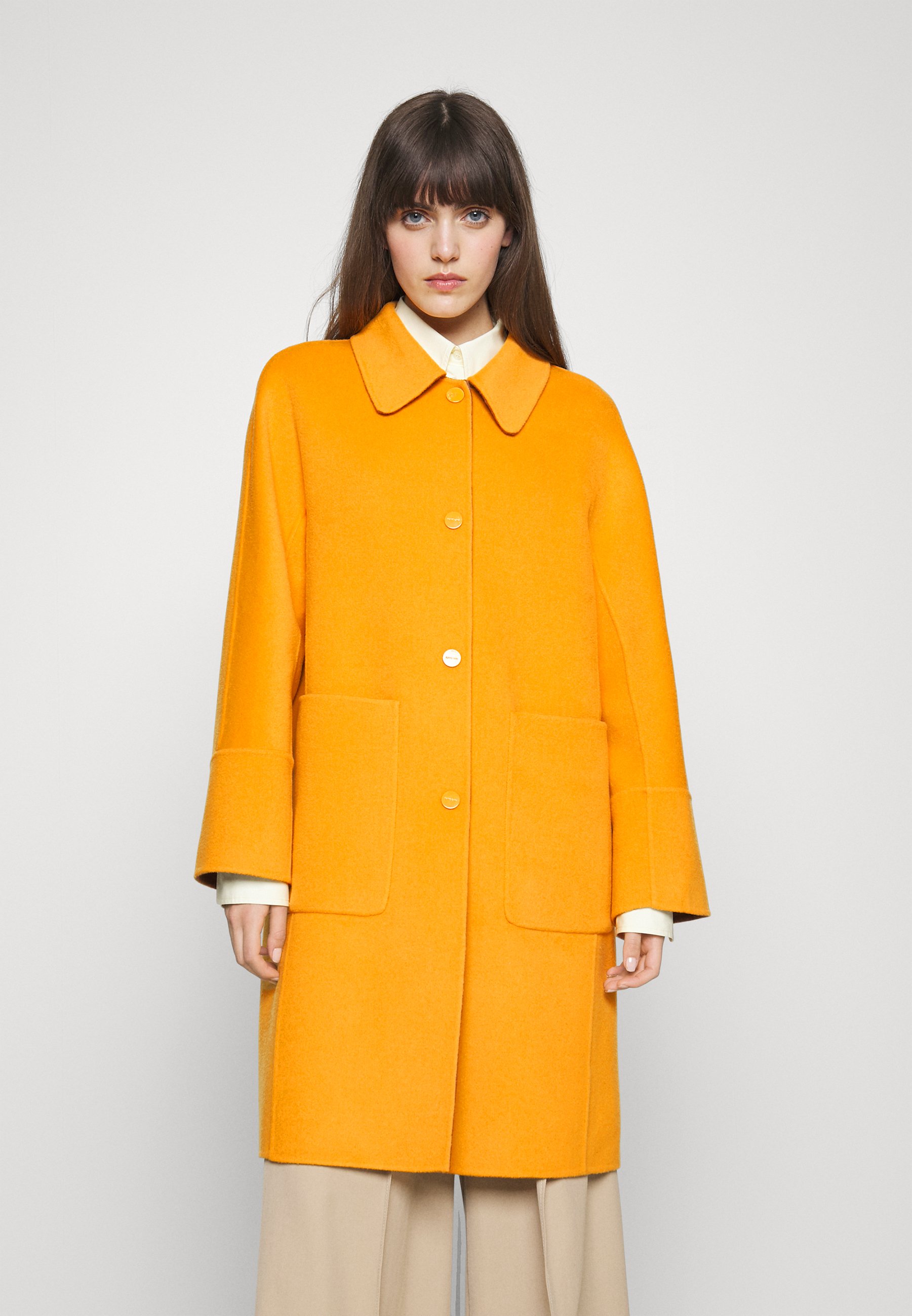orange brown coat