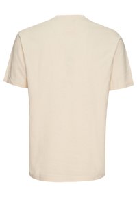Cremefarvet bomulds T-shirt, korte ærmer, rund hals, glat tekstur, simpelt design, ingen synlige mønstre eller detaljer.