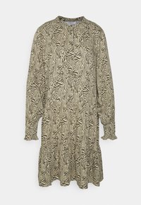 Vestido de mangas longas feito de tecido estampado com listras abstratas pretas e bege, com uma bainha voluminosa e um decote redondo.