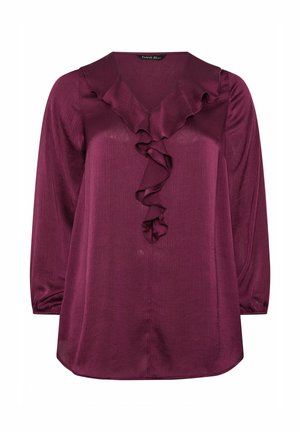 Bordeauxbluse med lange ærmer, der har en v-udskæring og en central flæse detalje. Lavet af blød, skinnende stof med en subtil tekstur.