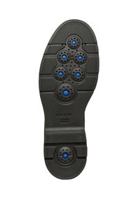Suela de zapato de goma negra con seis agujeros de ventilación azules, patrón texturizado y un área central suave. Presenta el texto "GEOX ITALIAN PATENT".
