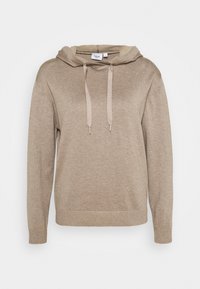 Beige stickad huva med långa ärmar, framdragband, ribbade ärmslut och nederkant, märkt storlek S, på en enkel vit bakgrund.