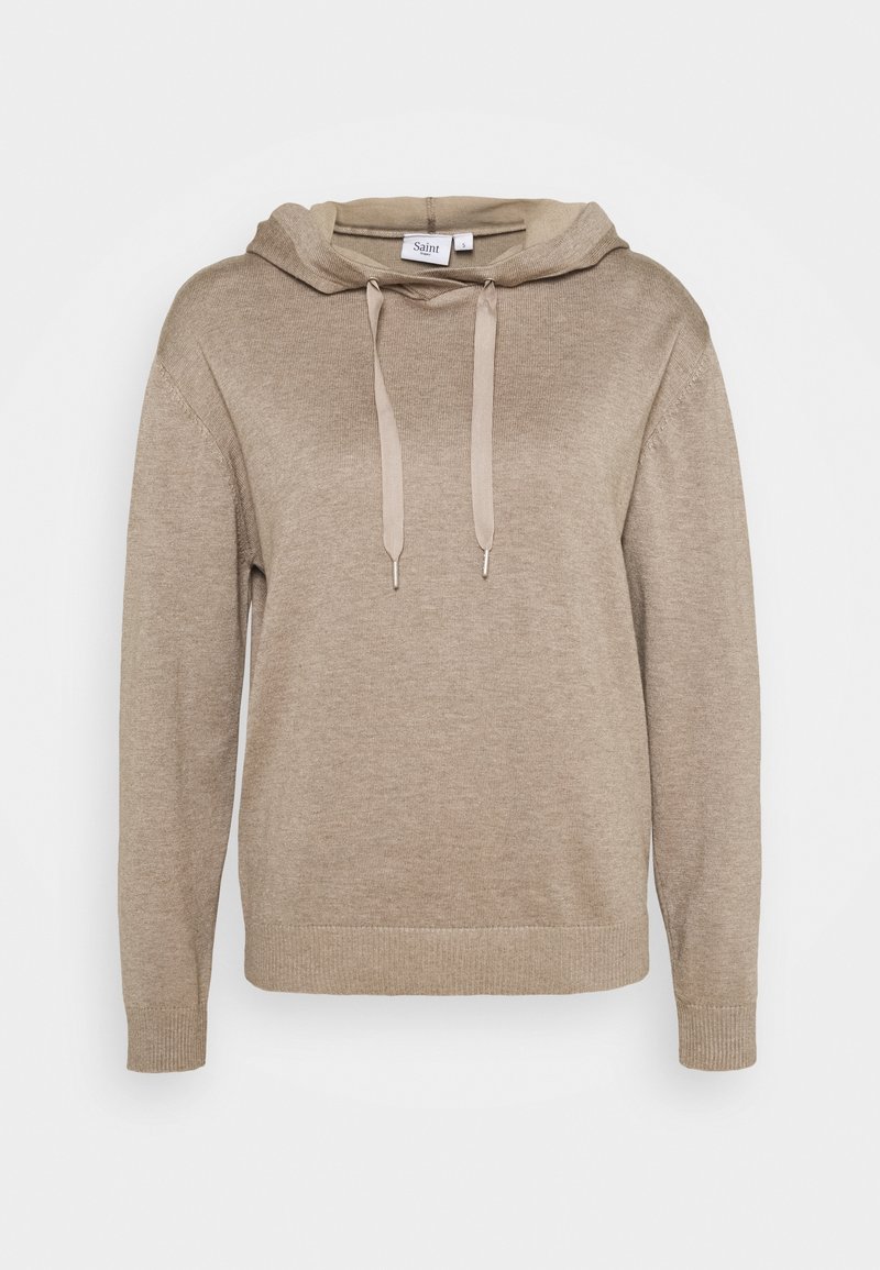 Beige stickad huva med långa ärmar, framdragband, ribbade ärmslut och nederkant, märkt storlek S, på en enkel vit bakgrund.