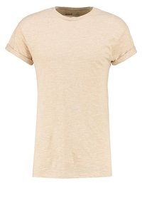 Ljusbeige t-shirt med kort ärm, tillverkad av ett texturerat, lätt tyg. Har en klassisk rund halsringning och uppvikta ärmslut.