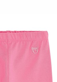 Różowe bawełniane legginsy z marszczonym pasem i haftowanym logo misia po lewej stronie. Gładka faktura, swobodny krój.
