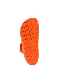 Orange rubber sandal sole with a wavy tread pattern and a strap design. Markings include size details and "Made in Spain."