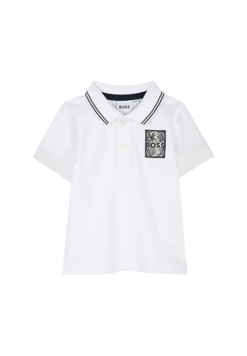 White polo shirt with short sleeves, a classic collar featuring navy trim, and a front patch with a black logo and palm design.