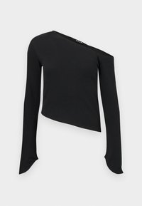 Must have mustrisetega mustriga mustrisetega keha osa peal, millel on lühem lõige, ebatavaline kaelus, soonik tekstuur ja pikad varrukad ümmarguste mansettide ning kootud viimistlusega.