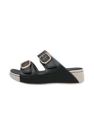 Sandale noire à bout ouvert avec deux brides réglables munies de boucles dorées et une semelle plateforme beige.