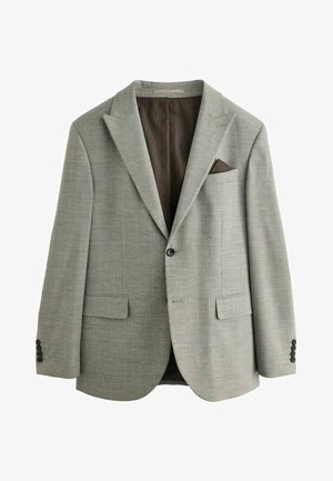 Lys grå blazer lavet af tekstureret stof med et subtilt tjekmønster, to forlommer, en brun inderside og et lommefyr.