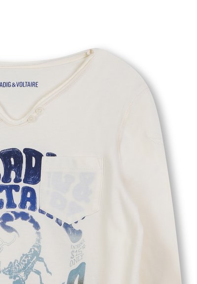 Cremefarbene Baumwollhemd mit langen Ärmeln, blauem Graf print, einer Brusttasche und einem V-Ausschnitt mit Knopfdetails.