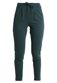 Green, tailored pants with a drawstring waist, pleats at the front, and a tapered leg design. Made from a smooth, stretchy material.