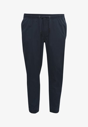 Granatowe spodnie dresowe wykonane z gładkiego materiału; posiadają elastyczny pas z sznurkiem, boczne kieszenie oraz ściągacze na kostkach.