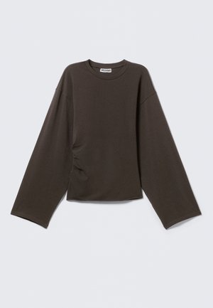 Dark brown long-sleeve top with a crew neckline, featuring a gathered detail on one side, made from a soft, stretchy material.