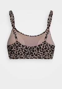 Leopardprint bralette met een naakte basis, verstelbare bandjes en een naadloos ontwerp. Lichtgewicht stof met een soepele textuur.