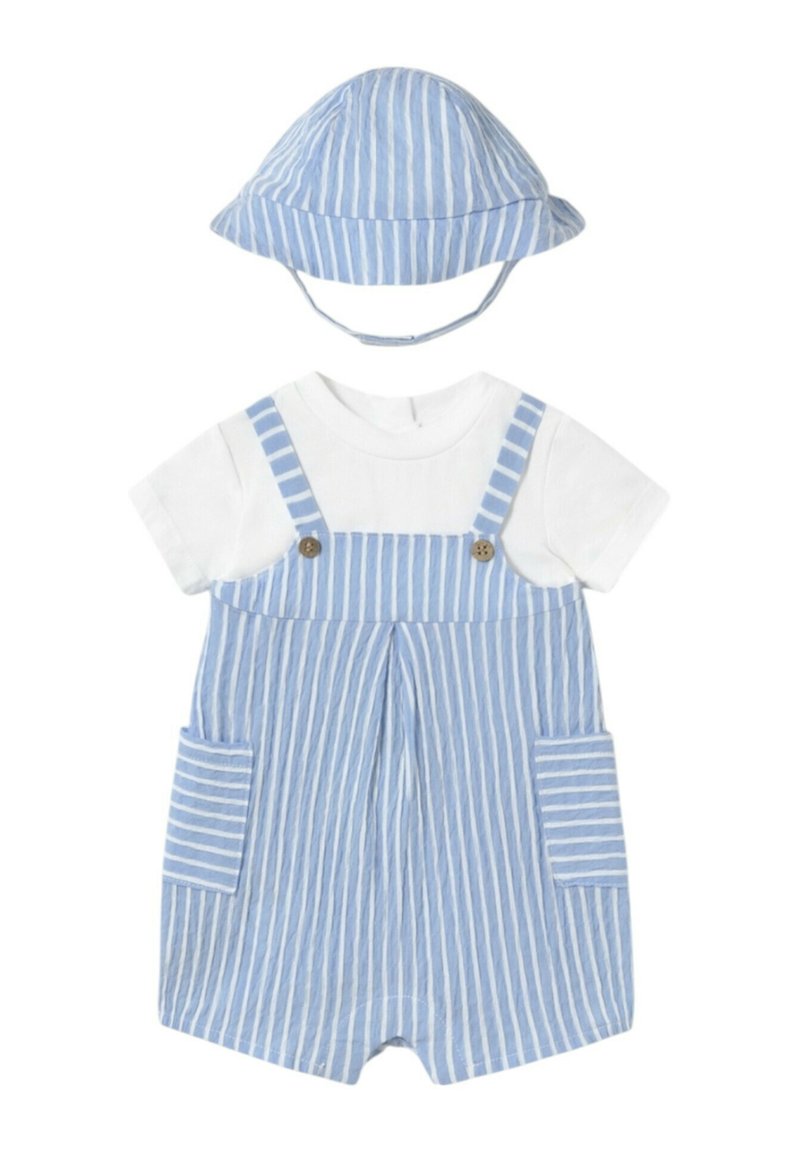 Jumpsuit de algodón a rayas azules y blancas con tirantes cortos, dos bolsillos frontales y un sombrero a juego con ala ancha.