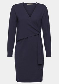 Marinblå omlottklänning med långa ärmar, V-ringning och sidoknytning. Tillverkad av mjukt tyg, med en slät textur och figursydd silhuett.