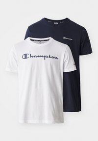 Twee T-shirts met korte mouwen, één wit met een marineblauw logo en één marineblauw met een wit logo, gemaakt van katoen met een ronde hals en een normale pasvorm.