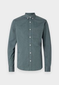 Mørkegrøn skjorte med knapper lavet af tekstureret stof, med spredt krave, lange ærmer, en enkelt brystlomme og hvide knapper.