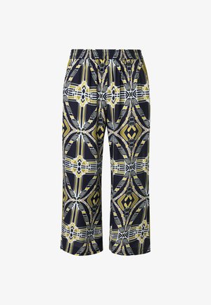 Weite Hose mit elastischem Bund, versehen mit einem abstrakten geometrischen Muster in Schwarz, Weiß und Senfgelb.