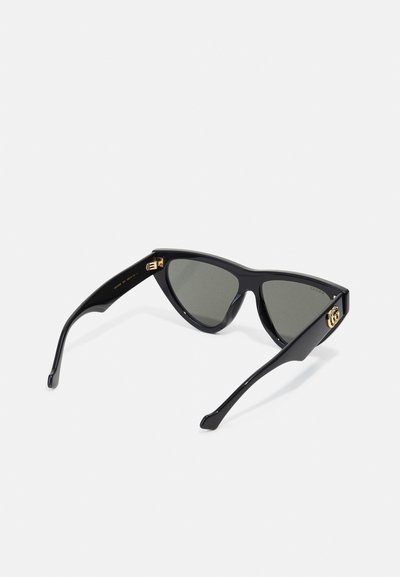 Black cat-eye sunglasses with gray lenses, cast metal accents at temples, glossy finish, smooth texture, and angular design.