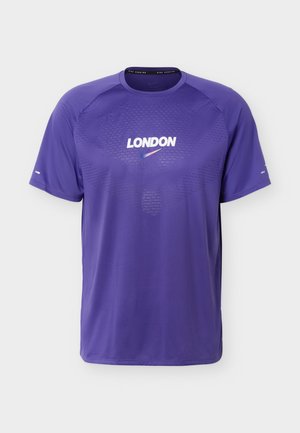Nike Performance, M CITY MRTH STRIDE SS LDN - Αθλητικό μπλουζάκι - court purple
