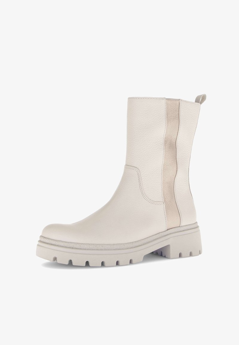 White leather ankle boot with textured finish, contrasting beige side panel, rounded toe, and chunky rubber sole with tread pattern.