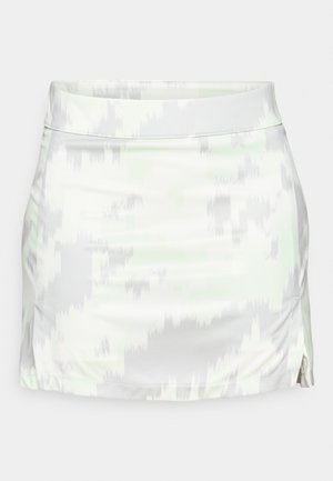 Bela mini krila z diskretnim zelenim in sivo abstraktnim vzorcem, izdelana iz gladkega elastičnega materiala s prilegajočim pasom in stranskim razporkom.